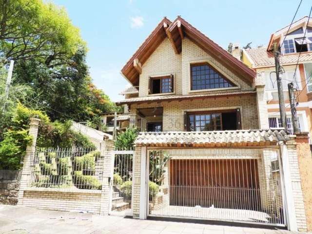 Casa com 3 quartos à venda na Rua Padre João Batista Reus, 629, Vila Conceição, Porto Alegre por R$ 980.000