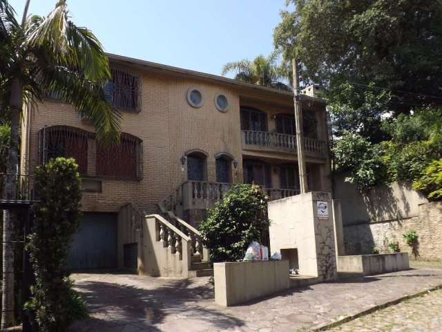 Casa com 6 quartos à venda na Praça José Assunção, 50, Vila Assunção, Porto Alegre por R$ 1.500.000