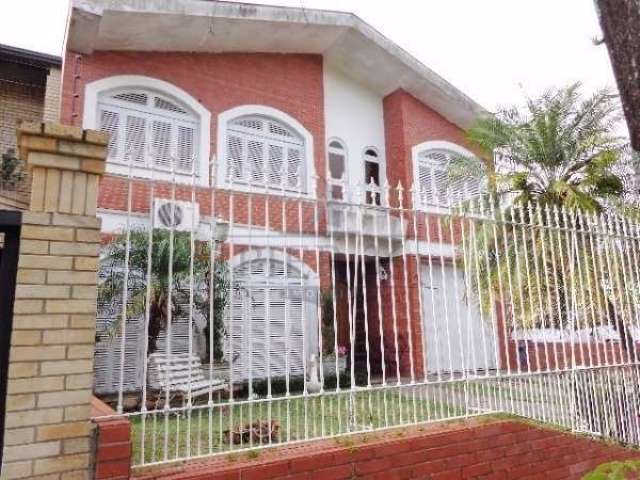 Casa com 4 quartos à venda na Rua Vicente Failace, 466, Tristeza, Porto Alegre por R$ 890.000