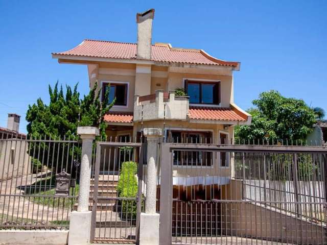 Casa com 4 quartos à venda na Rua Chiriguano, 227, Vila Assunção, Porto Alegre por R$ 1.650.000