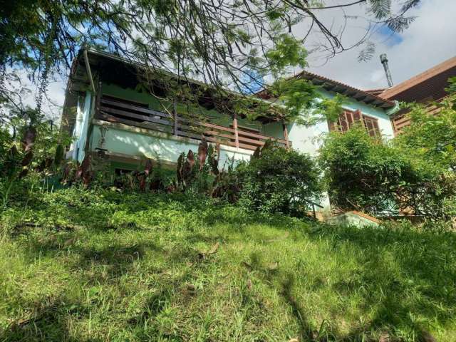 Casa com 5 quartos à venda na Rua Doutor Possidônio Cunha, 62, Vila Assunção, Porto Alegre por R$ 2.000.000