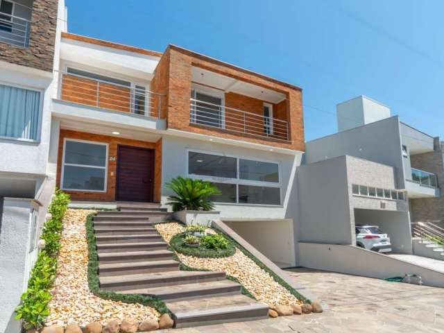 Casa em condomínio fechado com 3 quartos à venda na Rua Francisco Solano Borges, 200, Hípica, Porto Alegre por R$ 1.290.000