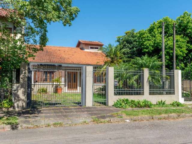 Casa com 3 quartos à venda na Jayme Saul de Borba, 40, Guarujá, Porto Alegre por R$ 650.000