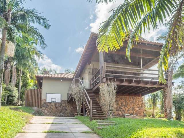 Casa em condomínio fechado com 3 quartos à venda na Estrada Jorge Pereira Nunes, 1780, Campo Novo, Porto Alegre por R$ 2.300.000