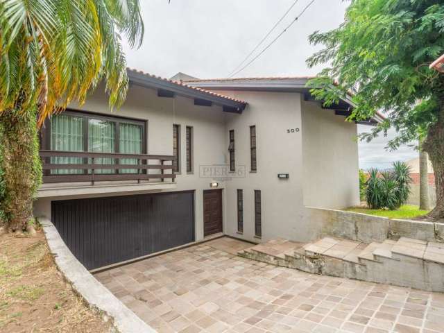 Casa com 3 quartos à venda na Rua Fernando Osório, 300, Teresópolis, Porto Alegre por R$ 1.500.000