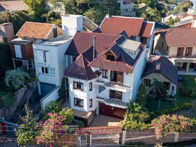 Casa com 6 quartos à venda na Rua Coronel Gomes de Carvalho, 311, Sétimo Céu, Porto Alegre por R$ 1.690.000