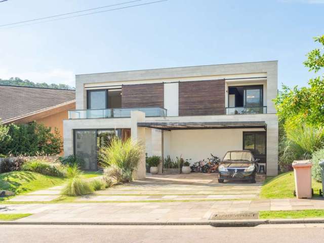 Casa em condomínio fechado com 4 quartos à venda na Estrada das Três Meninas, 2000, Vila Nova, Porto Alegre por R$ 2.190.000