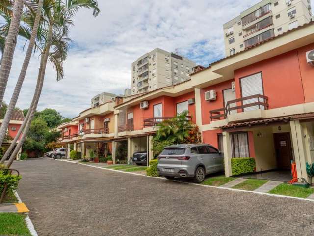 Casa em condomínio fechado com 3 quartos à venda na Rua Doutor Armando Barbedo, 1161, Tristeza, Porto Alegre por R$ 1.010.000