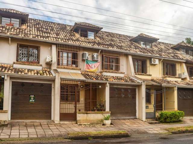 Casa com 3 quartos à venda na Travessa Nossa Senhora de Lourdes, 277, Tristeza, Porto Alegre por R$ 590.000