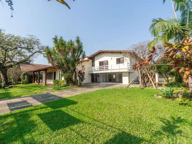 Casa com 5 quartos à venda na Rua Engenheiro Jorge Porto, 211, Ipanema, Porto Alegre por R$ 1.590.000