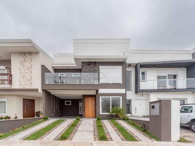 Casa em condomínio fechado com 3 quartos à venda na Rua Jorge Babot Miranda, 680, Aberta dos Morros, Porto Alegre por R$ 990.000