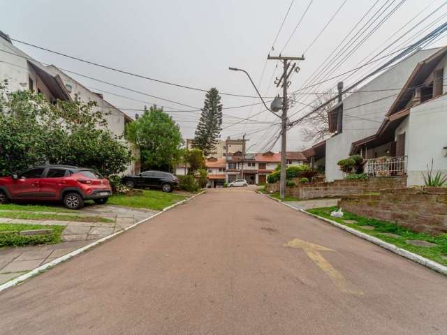 Casa em condomínio fechado com 3 quartos à venda na Avenida Eduardo Prado, 695, Cavalhada, Porto Alegre por R$ 570.000