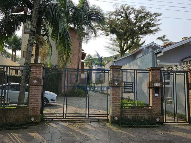 Casa em condomínio fechado com 3 quartos à venda na Rua João Mendes Ouriques, 579, Jardim Isabel, Porto Alegre por R$ 690.000