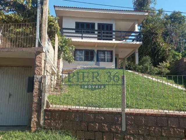 Casa com 3 quartos à venda na Rua Liberal, 97, Sétimo Céu, Porto Alegre por R$ 1.390.000