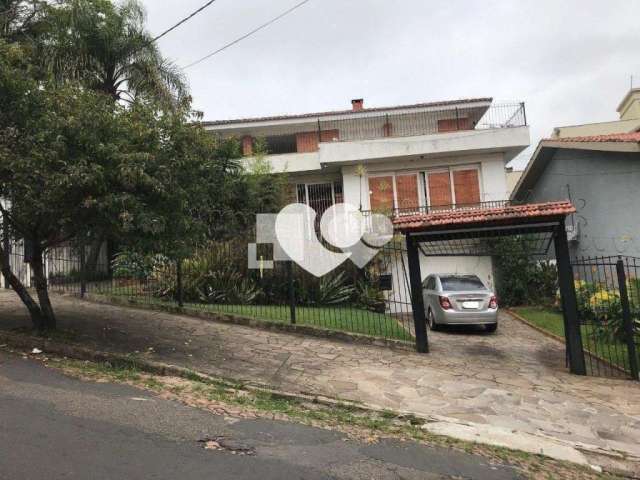 Casa com 6 quartos à venda em Menino Deus - RS