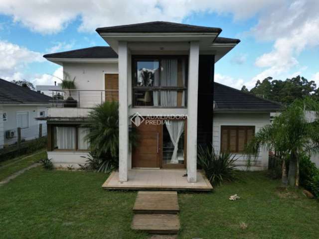 Casa com 3 quartos à venda na Claudio Henrique Alberti, 664, Bosque do Albatroz, Osório, 120 m2 por R$ 850.000