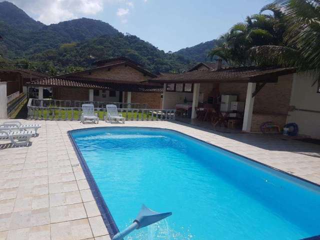 Casa em condomínio fechado com 6 quartos à venda em Horto Florestal, Ubatuba  por R$ 1.200.000