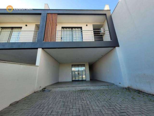 Sobrado com 3 dormitórios à venda, 146 m² por R$ 999.900,00 - Centro - Balneário Piçarras/SC