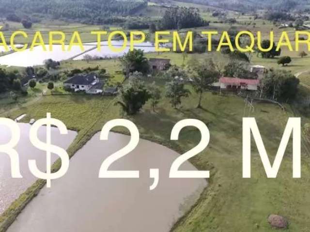 Super chácara com casa, piscina, açude, galpão e animais em taquara