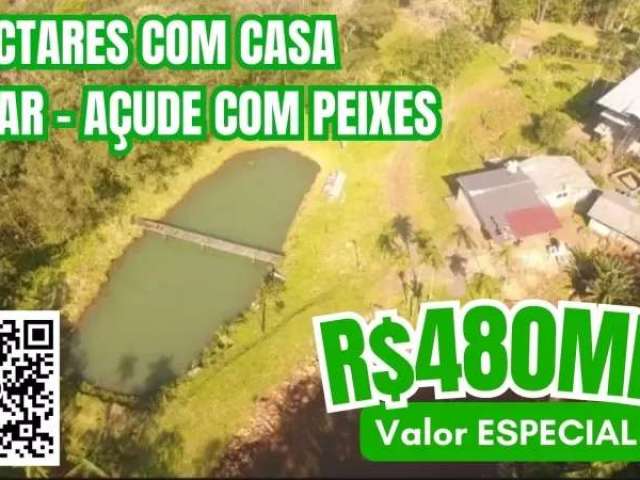 [392]chácara  2ha sobrado  3 pisos, pomar, açudes com peixes , aceita carro, casa ou parcela