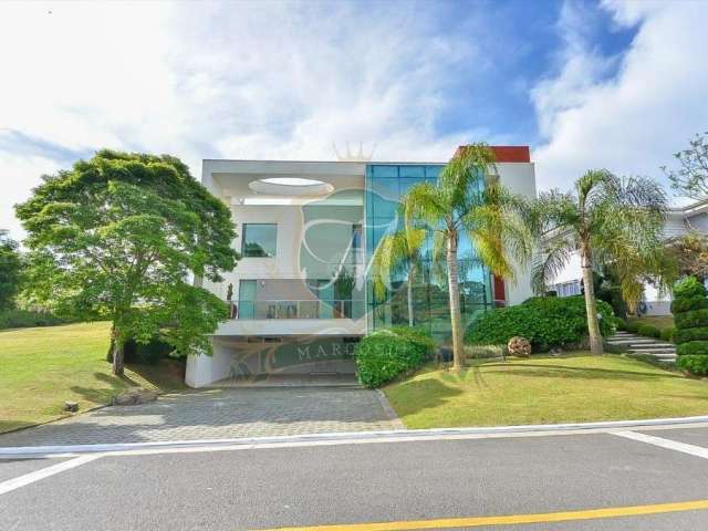 casa de 615 m²  a venda no alphavile graciosa, com 5 suites, 7 bh, 3 salas, 4 gar.,cozinha americana completa,  piscina aquecida, edicula, escritorio