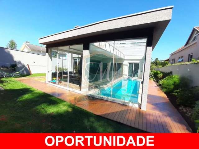 Linda casa tipo sobrado a venda no Alphaville Graciosa em Pinhais, com 550 m², 4 quartos, 5 bh, escritorio, area gourmet com piscina coberta, 3 salas,