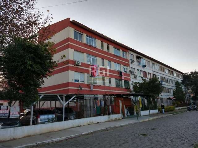 Apartamento  2 dormitórios com garagem escriturada localizado no Bairro Rubem Berta em Porto Alegre. Living para 2 ambientes, banheiro social. Próximo a mercados, farmácia,, transporte público e comér