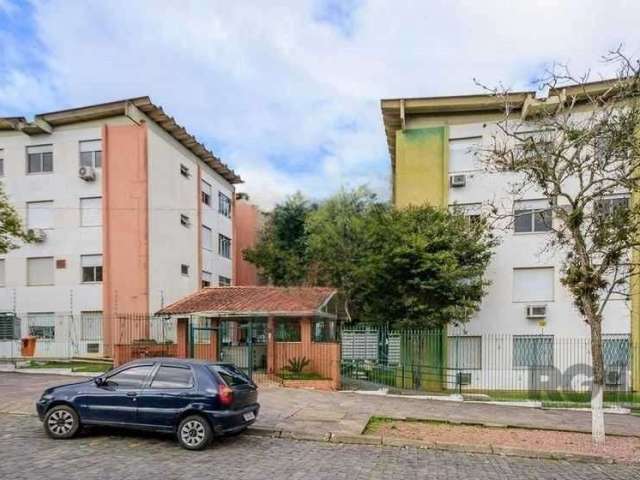 Apartamento no Jardim Vila Nova, Zona Sul de Porto Alegre. Possui 2 dormitórios, living para 2 ambientes, cozinha, área de serviço, banheiro social, reformado, impecável, piso laminado,  ficam os móve