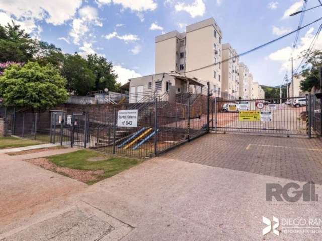 Apartamento com 2 dormitórios bairro Glória, Zona Sul de Porto Alegre. Possui living para 2 ambientes, banheiro social com box de vidro temperado, cozinha e área de serviço integrada.&lt;BR&gt;Condomí