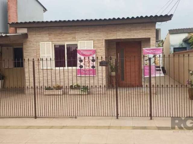 Convido você a conhecer esta encantadora casa, localizada em Gravataí/RS.&lt;BR&gt;Com um ambiente aconchegante, esta bela casa conta com três dormitórios, sendo um com closet, cozinha ampla com sala 