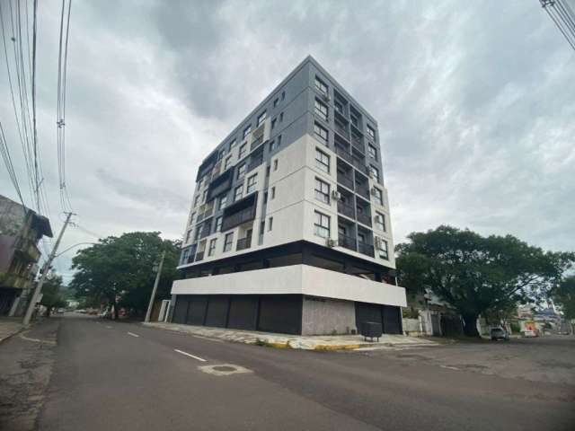 Apartamento central com 1 dormitório, sala e cozinha conjugados e 1 banheiro. Semi mobiliado com uma TV de 43 polegadas, um ar condicionado de 18 mil btus e outro de 12 mil btus, uma geladeira Frost F