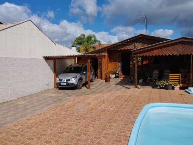 Casa com amplo terreno 11x30 no Jardim dos Lagos. &lt;BR&gt;Composto por uma casa mista ( madeira/alvenaria) medindo 99 m², com sala, cozinha, 3 banheiros, 3 dormitórios sendo 1 suite, garagem para do