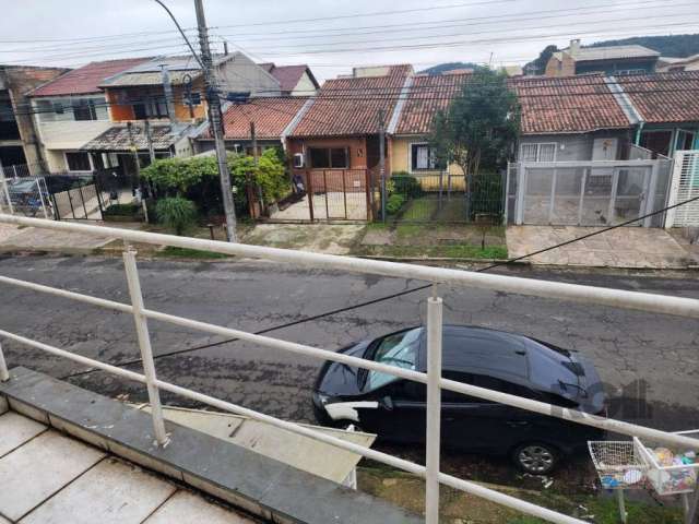 casa 2  dormitórios, banheiro social, lavabo living 2 ambinetes, cozinha vaga de garagem cobeta, sacada e pátio