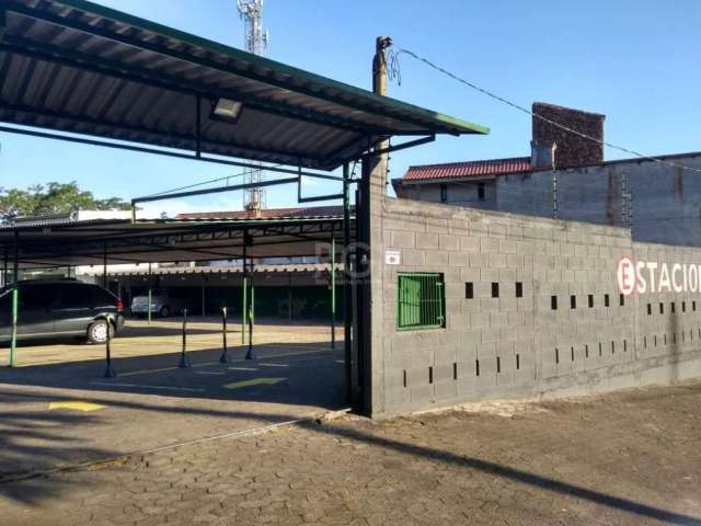 Terreno com 2 lotes individualizados com 32X31,5, com 992m² próximo à Cristiano Fischer, Clube Farrapos, com estacionamento (50 box  cobertos locados mensalista, comprovação rendimentos em planilhas c