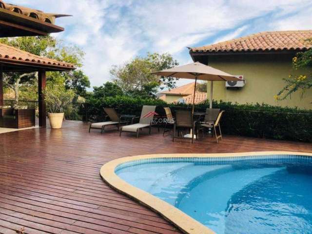 Casa em condomínio a poucos passos da praia com 05 suítes e piscina privativa