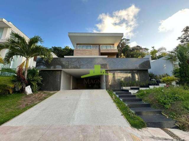 Casa de luxo à venda no Alphaville 1 Salvador | 4 suítes com varanda | Gabinete | Espaço gourmet com piscina e prainha | Reformada | R$ 3.900.000