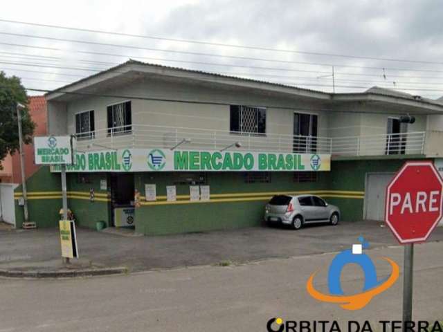 Casa 3 dormitórios, sendo 1 suíte, sala ampla, área de serviços, 2 vagas de garagens fechadas, super mercados montado no salão térreo,