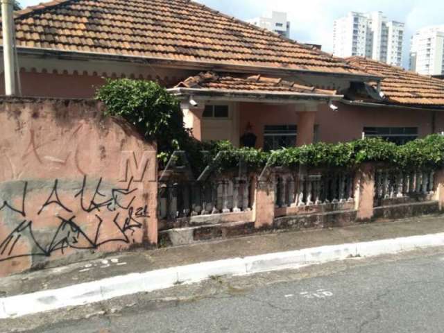 Terreno à venda com duas casas, 2 dormitórios, sala, cozinha, na Santa Teresinha.