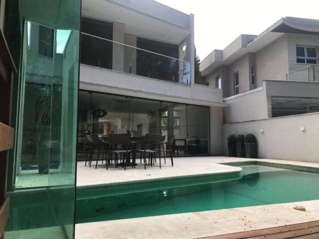 Casa com 5 dormitórios à venda, 419 m² por R$ 10.000.000,00 - Riviera Módulo 21 - Bertioga/SP