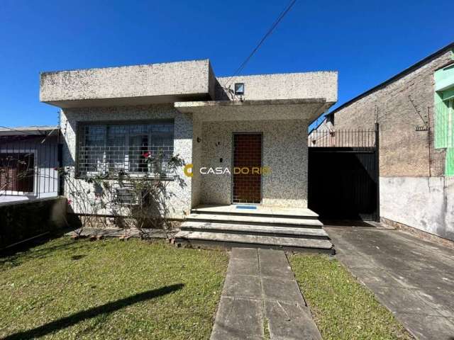 Casa com 3 quartos à venda na Rua Teotônia, 42, Camaquã, Porto Alegre por R$ 500.000