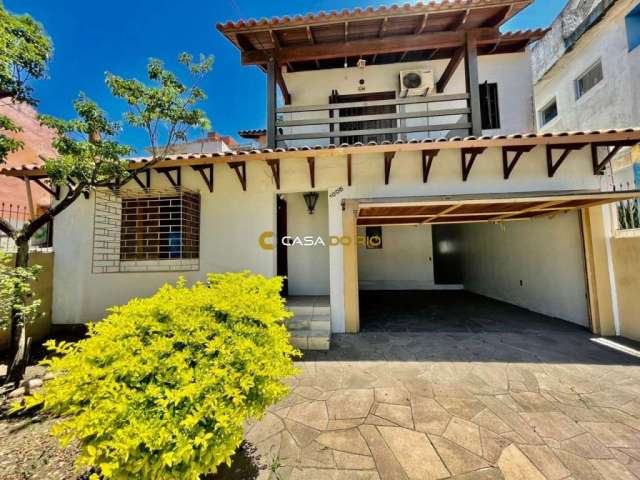 Casa com 3 quartos à venda na Octávio de Souza, 1005, Nonoai, Porto Alegre por R$ 590.000