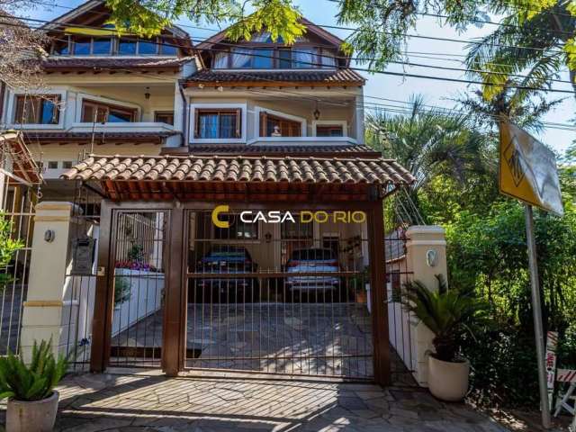 Casa em condomínio fechado com 4 quartos à venda na Travessa Pedra Redonda, 506, Jardim Isabel, Porto Alegre por R$ 990.000