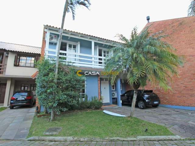 Casa em condomínio fechado com 4 quartos à venda na Rua Conrado Ferrari, 71, Jardim Isabel, Porto Alegre por R$ 870.000