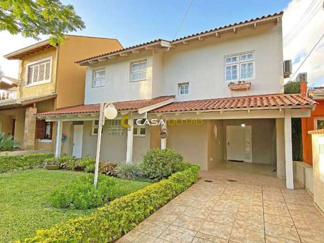 Casa em condomínio fechado com 4 quartos à venda na Avenida Juca Batista, 1200, Cavalhada, Porto Alegre por R$ 890.000