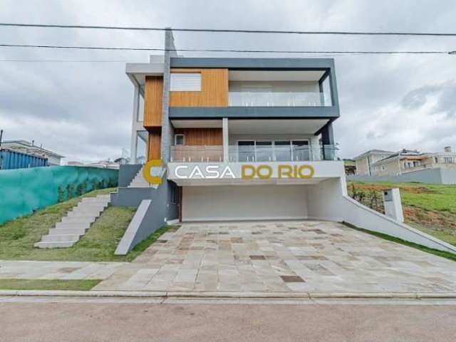 Casa em condomínio fechado com 4 quartos à venda na Estrada das Três Meninas, 2001, Vila Nova, Porto Alegre por R$ 2.600.000