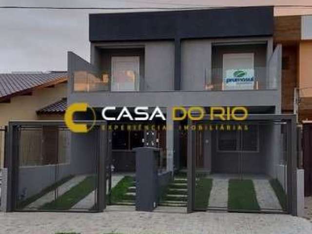 Casa com 3 quartos à venda na Rua Itacyr Rossi, 33, Guarujá, Porto Alegre por R$ 560.000