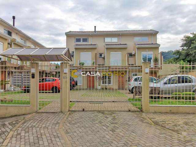 Casa em condomínio fechado com 2 quartos à venda na Rua José Pereira da Cunha, 68, Vila Nova, Porto Alegre por R$ 390.000