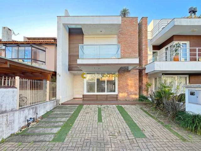 Casa em condomínio fechado com 3 quartos à venda na Rua Carlos Maximiliano Fayet, 80, Hípica, Porto Alegre por R$ 818.000