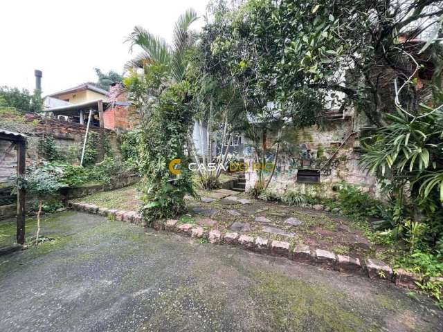 Casa com 4 quartos à venda na Rua Oscar Tollens, 63, Santa Tereza, Porto Alegre por R$ 700.000