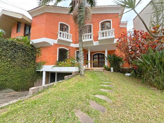 Casa com 5 quartos à venda na Avenida Icaraí, 120, Cristal, Porto Alegre por R$ 1.100.000